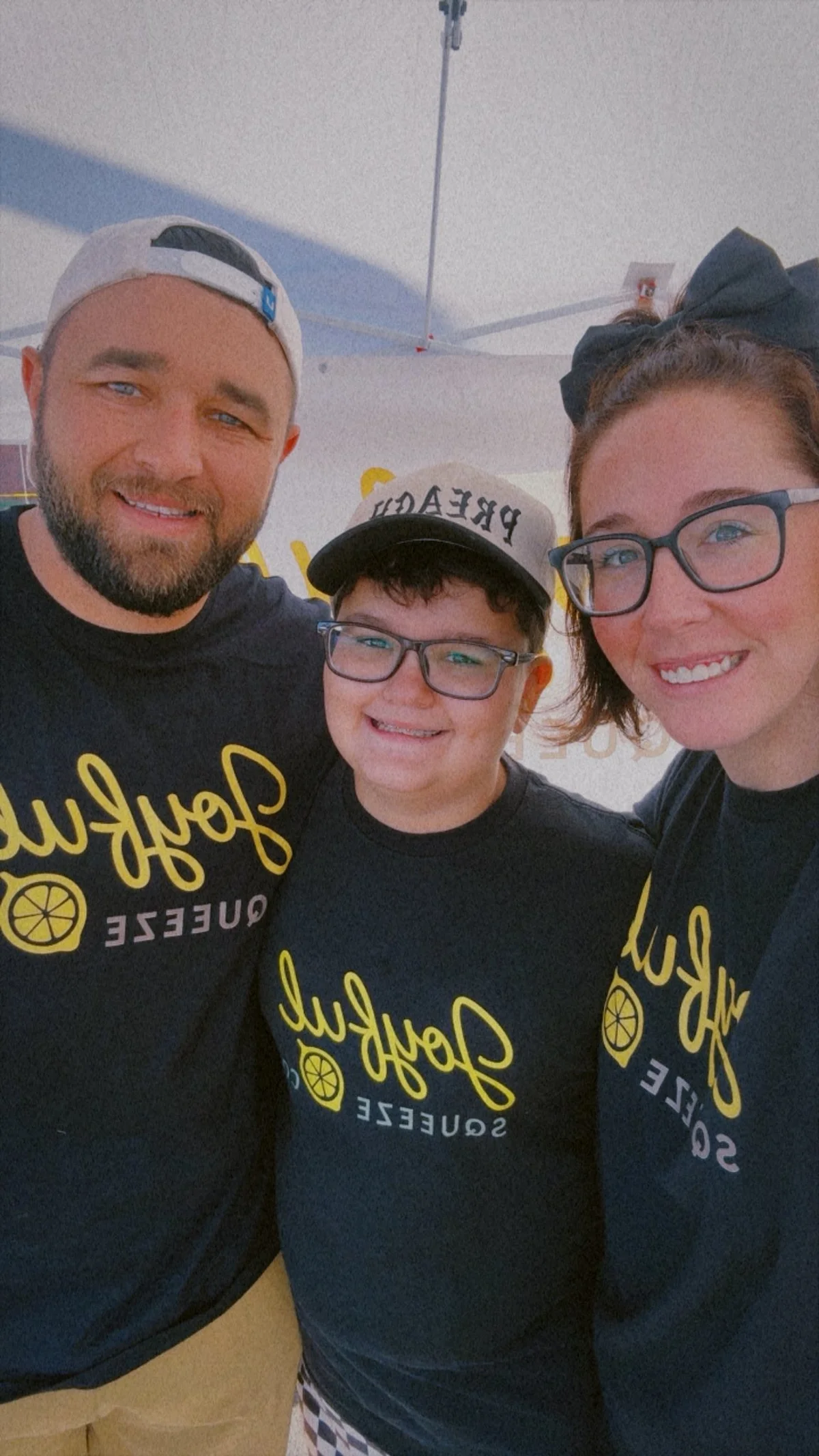 Blayne and family sharing a joyful moment